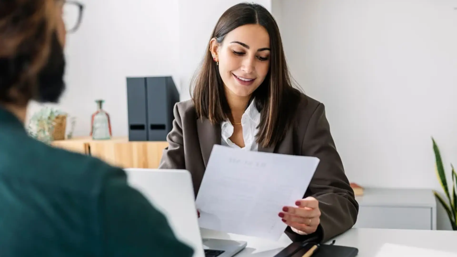 Woman looking at her resume